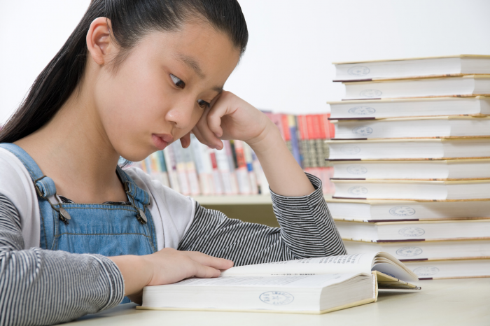 Girl and books